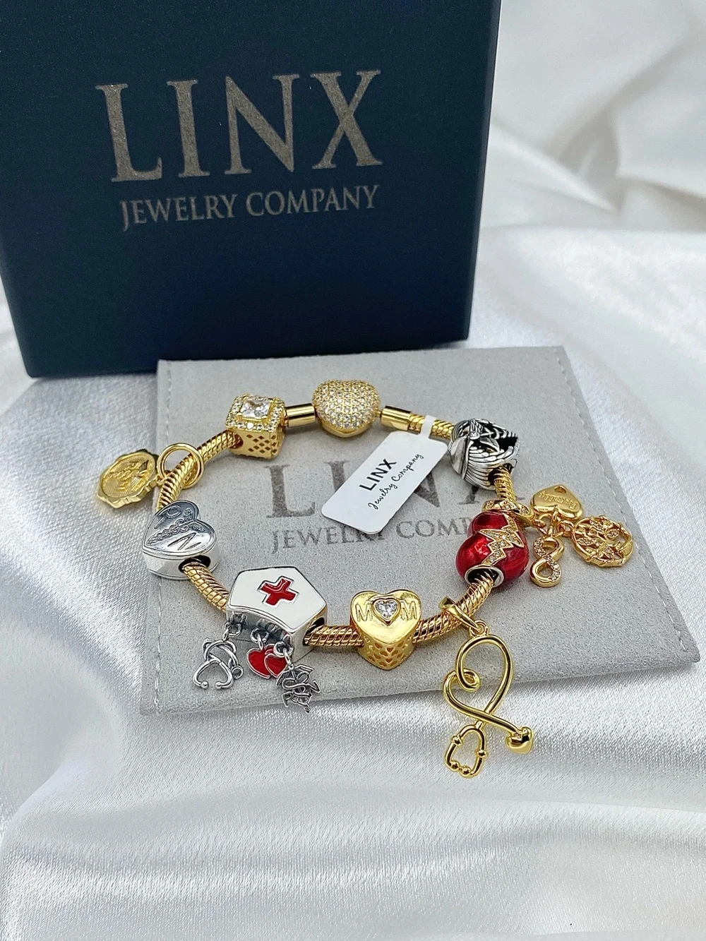 Linx Gold Snake Chain Charm Bracelet with Registered Nurse, Mom & Family Charms